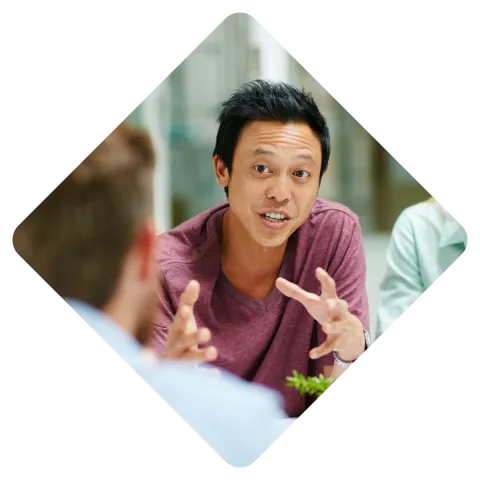 A man talking in a group